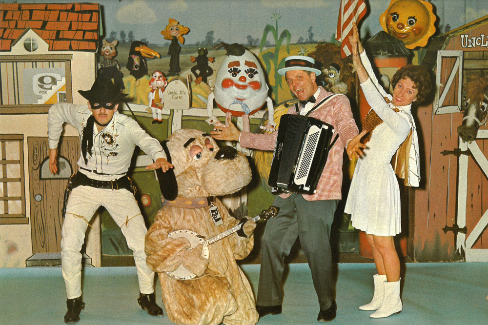 Full color photo Of characters from Scripps' The Uncle Al Show Performing With Instruments
