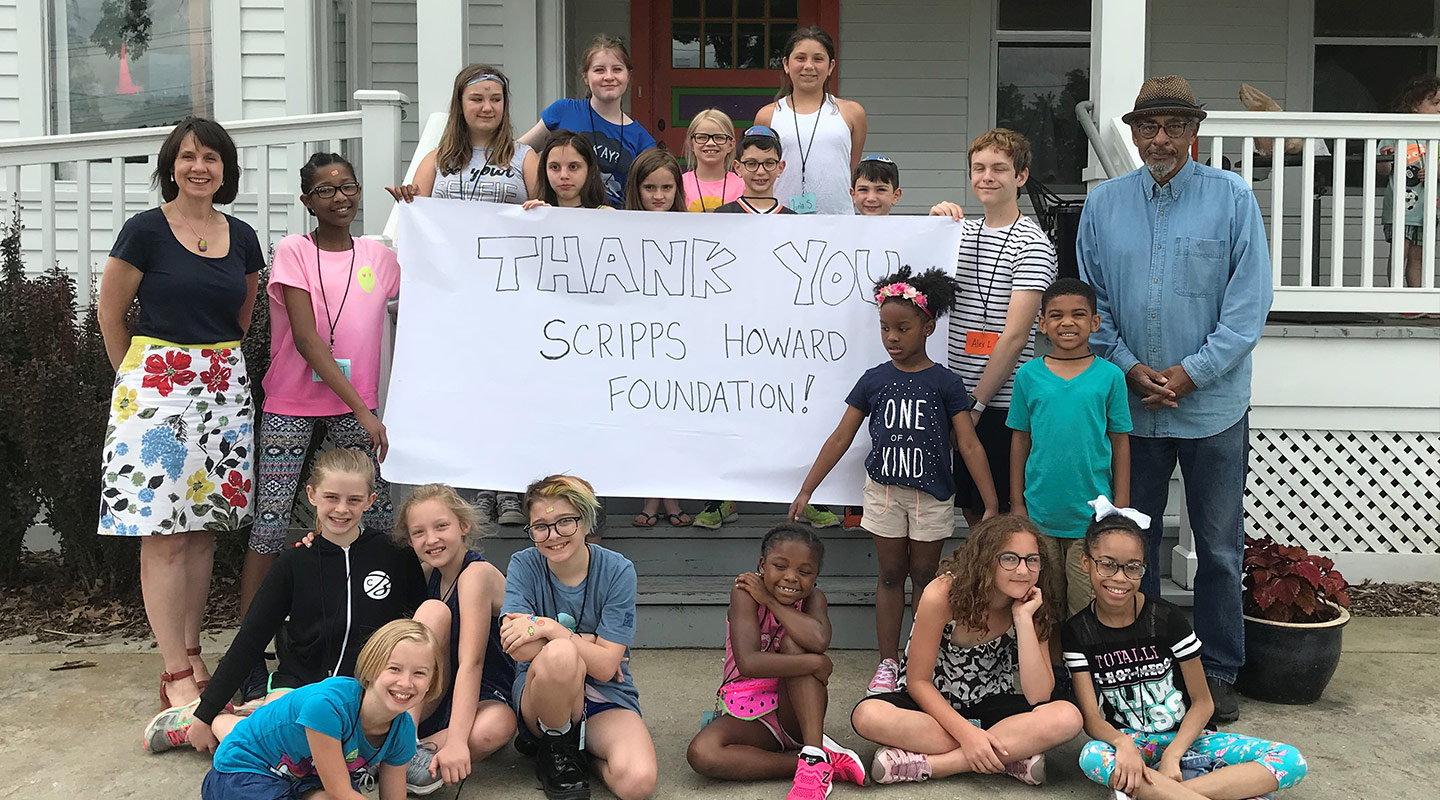 Children holding thank you Scripps Howard foundation sign