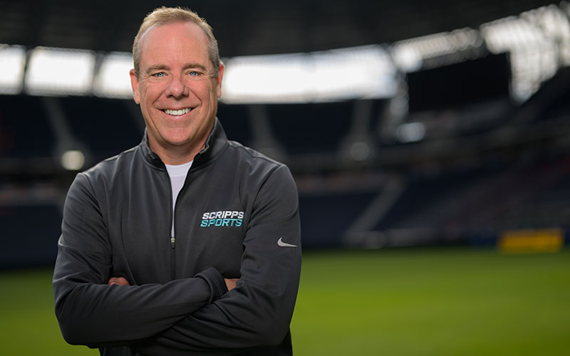 Brian of Scripps Sports is standing in a soccer stadium