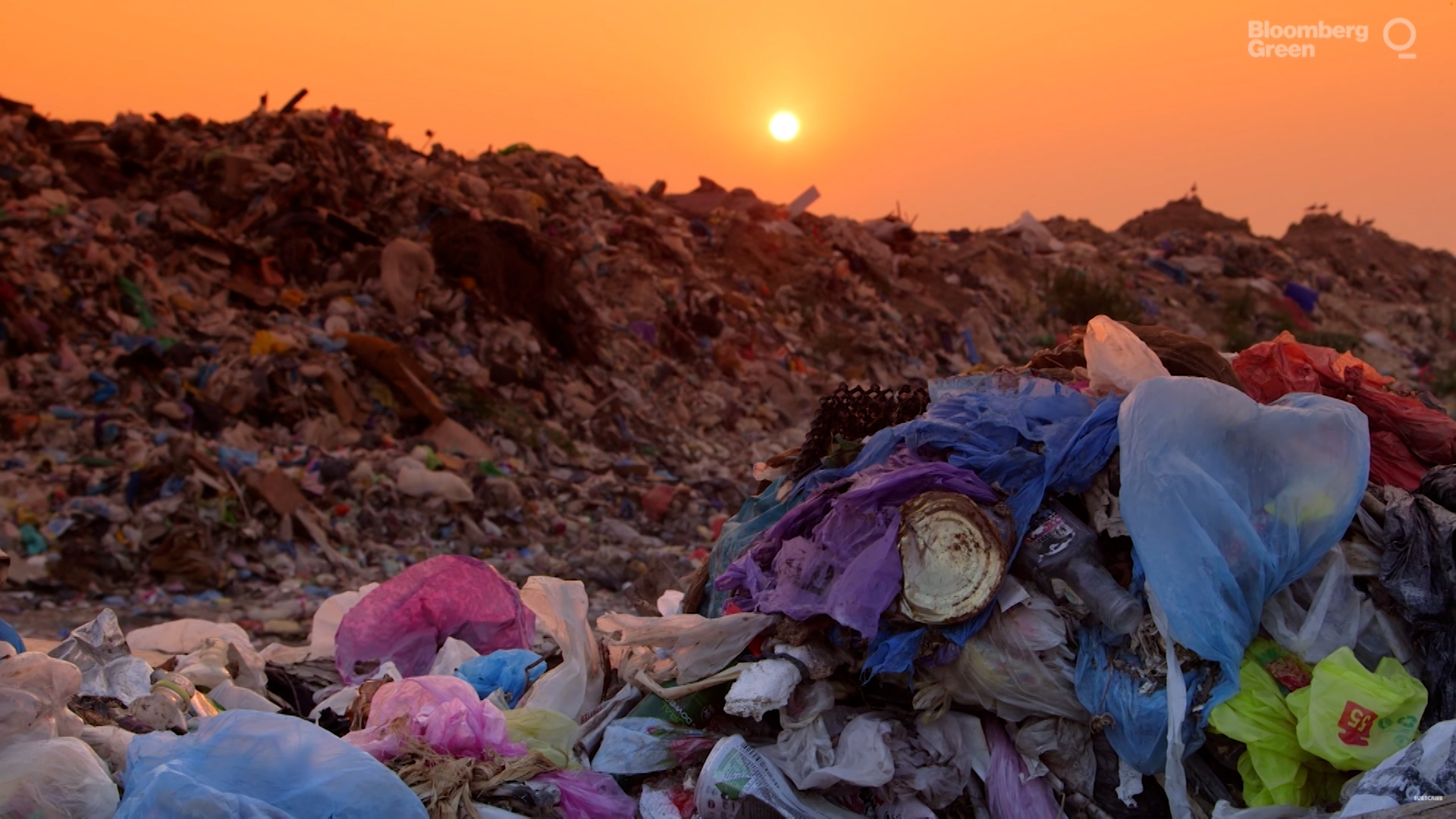 This image shows several landfills of trash, mostly containing plastic.