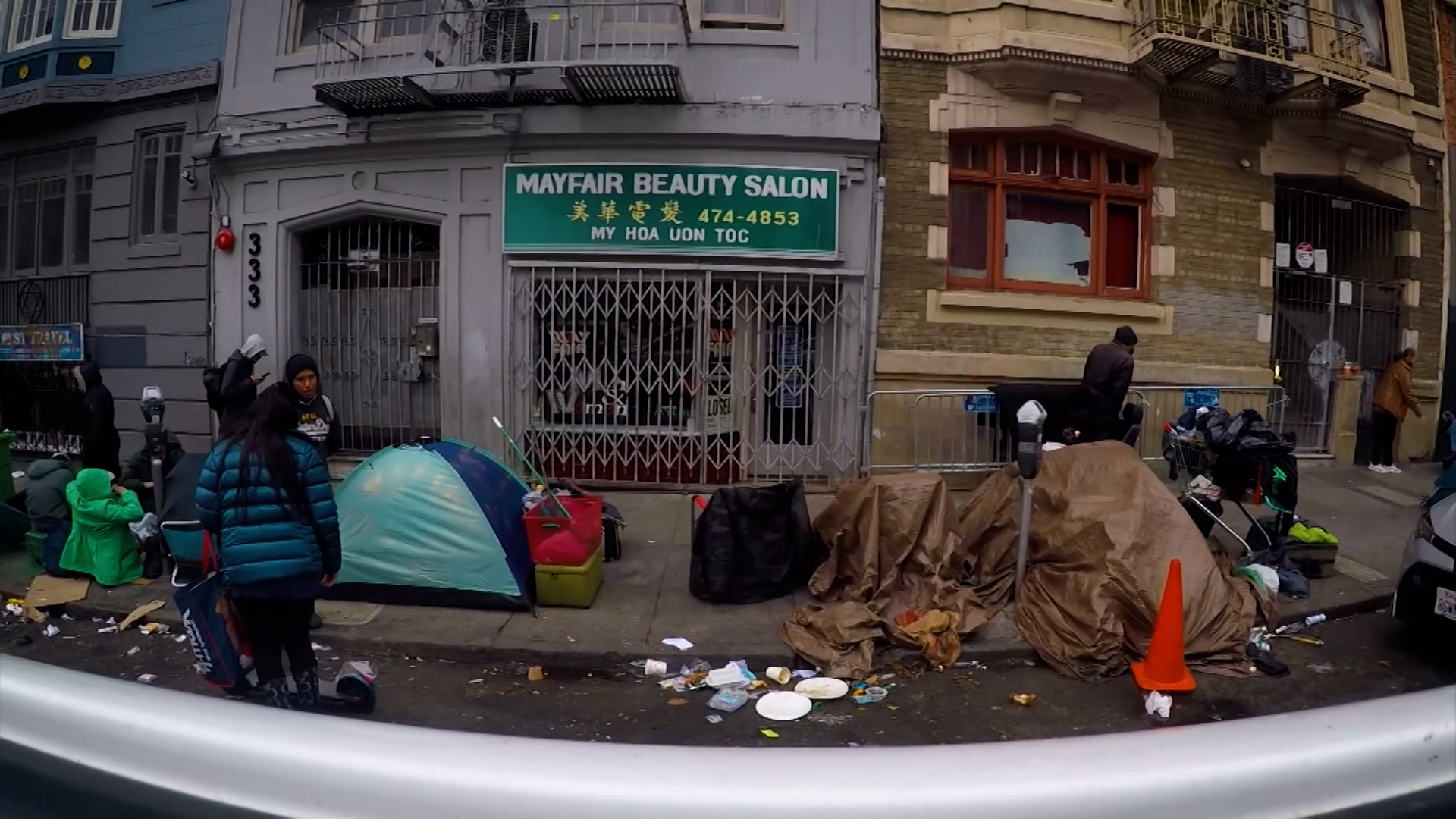 This is an image of impoverished and homeless folks on the streets of San Francisco.